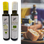 Afbeelding van een cadeauverpakking met twee flessen S&J Gusto olijfolie; de set bevat de klassieke en de frisse citroensmaak.